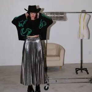 Dressed in LALA Metallic Pleated Midi
Skirt in Sterling Silver